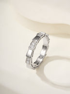 Bvlgari silver bangle bracelet with rectangular link design and clear gem accents