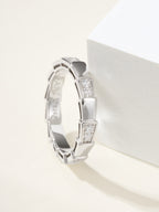 Bvlgari silver bangle bracelet, side view of raised gem square links