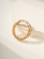 Bvlgari gold bangle bracelet with open rectangular link band detailing