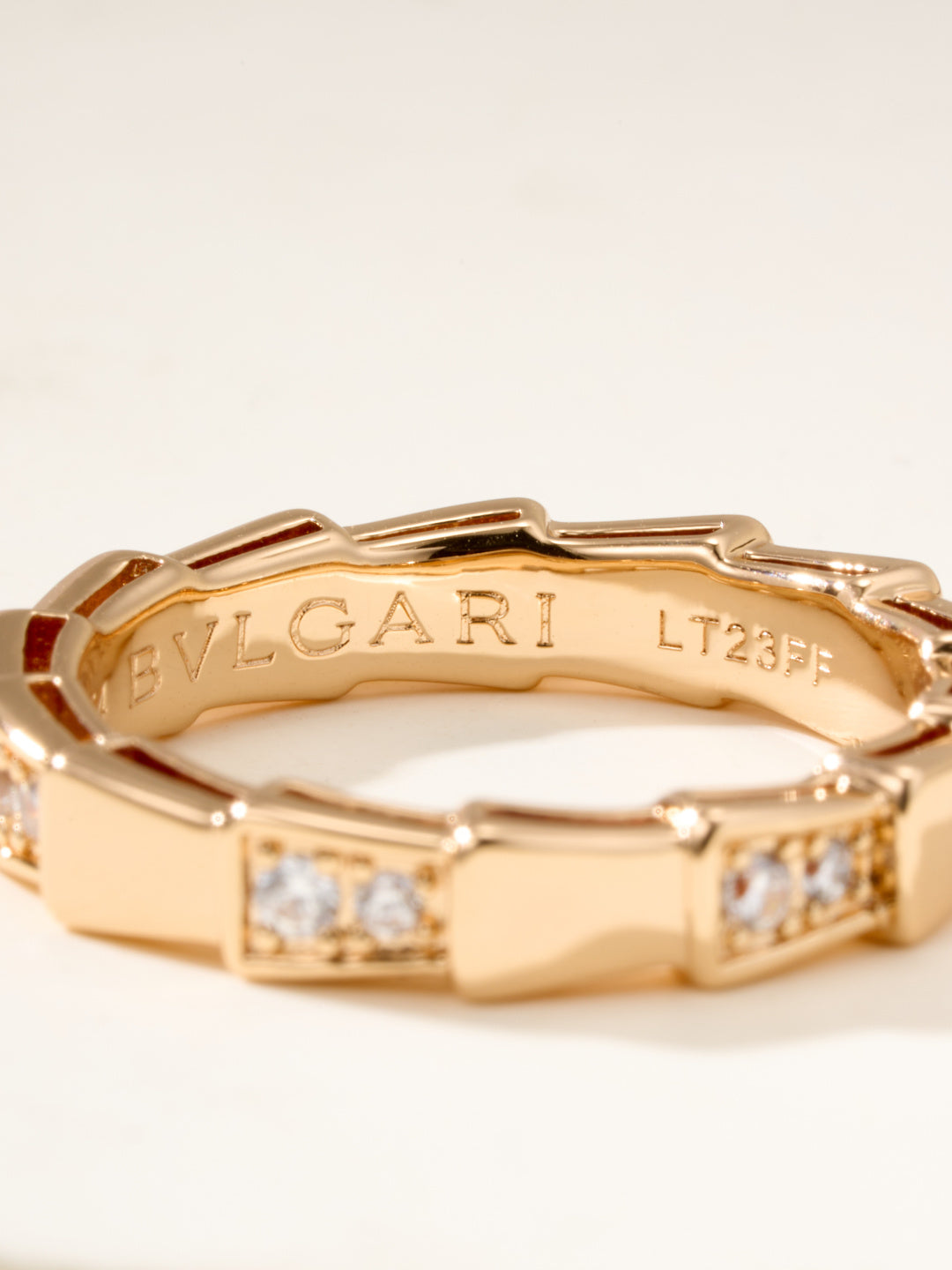 Bvlgari gold bangle bracelet, interior engraving and gem-set square links