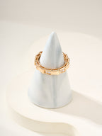 Bvlgari gold bangle bracelet with gem pavé rectangular links