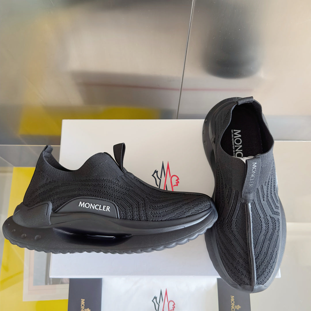 Moncler slip-on knit sneakers with MONCLER logo on side and air-cushioned sole