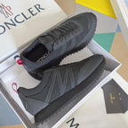 Moncler lace-up sneakers in dark gray with sporty knit uppers and serrated tread sole.