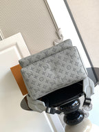 Louis Vuitton monogram shoulder bag with light gray flap and black strap