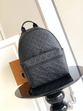 Louis Vuitton monogram backpack in dark embossed leather, front view with top handle