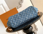 Blue monogram tote bag, long shape with tan trim and gold hardware