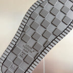 Grey rubber outsole for Louis Vuitton slide sandal with embossed monogram grip