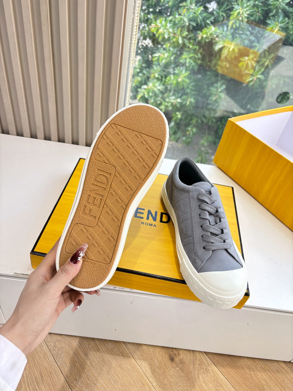 Fendi ladies sneakers, gray upper with tan outsole and white logo stripe