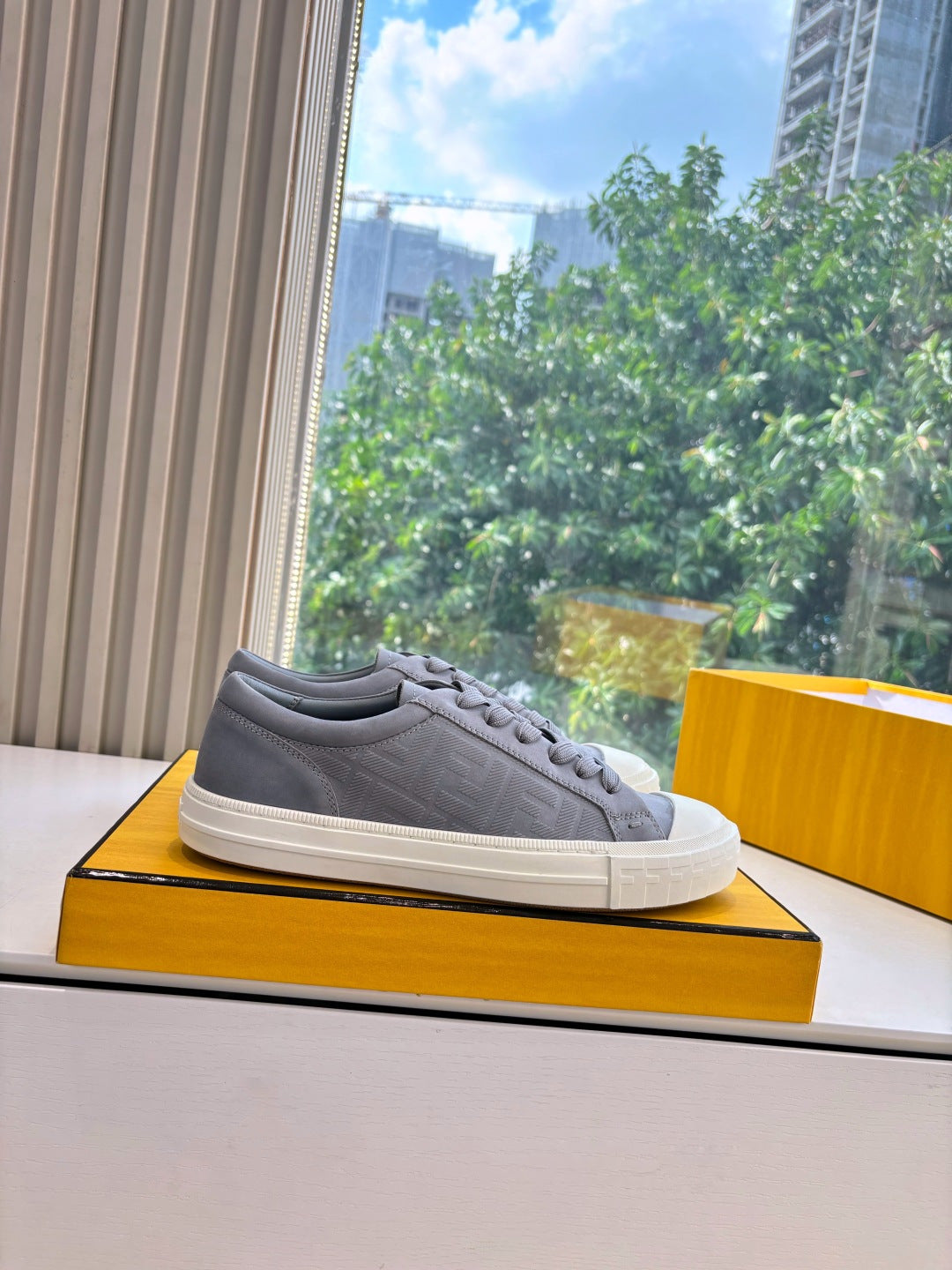 Fendi ladies sneakers, gray low-top with white rubber sole and lace-up