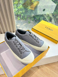 Fendi ladies lace-up sneakers, gray upper with white rubber sole and stitched toe
