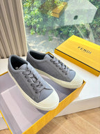 Fendi ladies lace-up sneakers, gray upper with white rubber sole and stitched toe