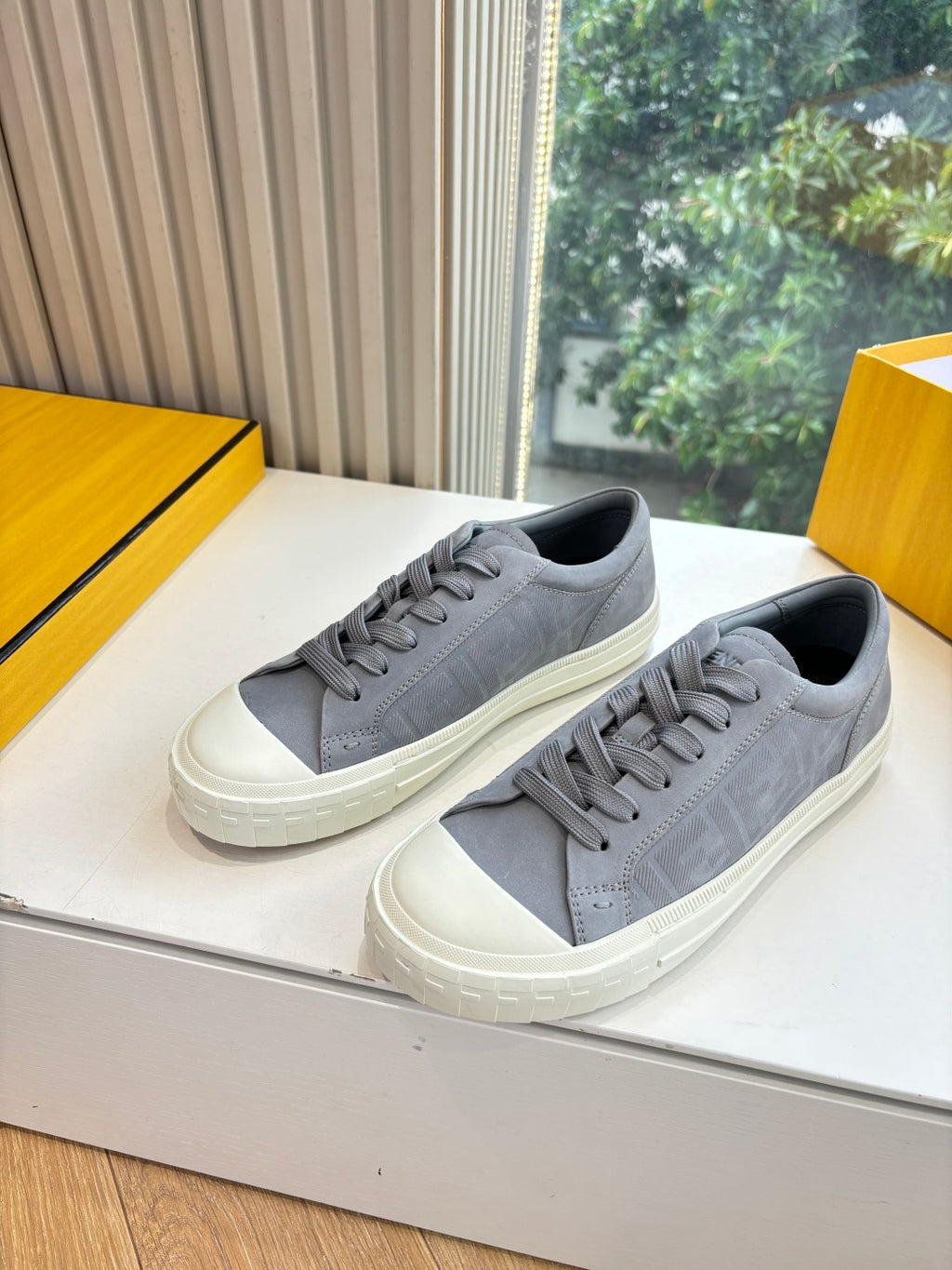 Fendi ladies lace-up sneakers, gray and white colorway with smooth toe cap