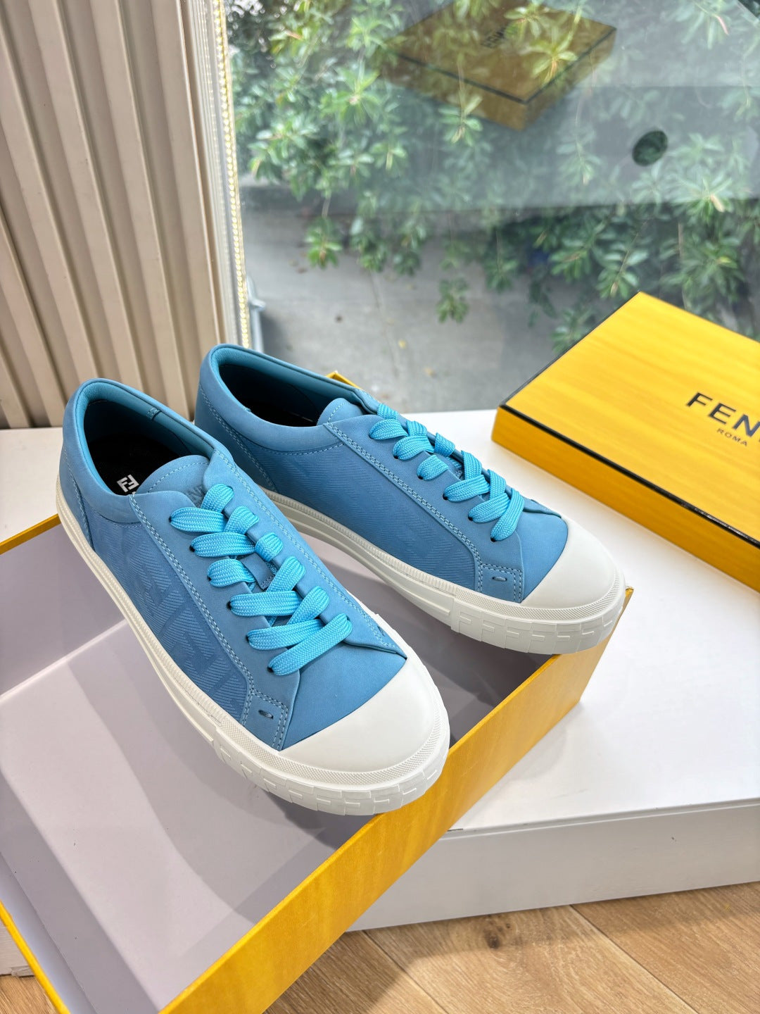 Fendi ladies low-top sneakers, light blue suede with turquoise laces and white sole