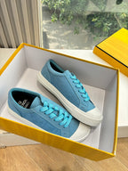 Fendi ladies low-top sneakers in box, light blue suede, turquoise laces, white sole
