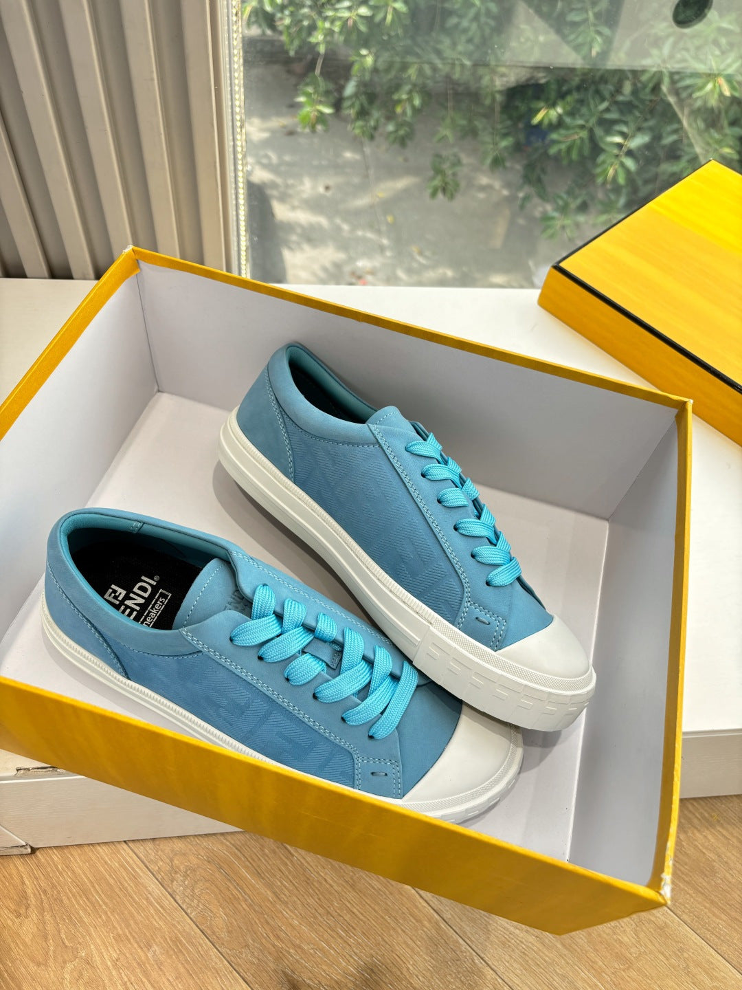Fendi ladies low-top sneakers in box, light blue suede, turquoise laces, white sole