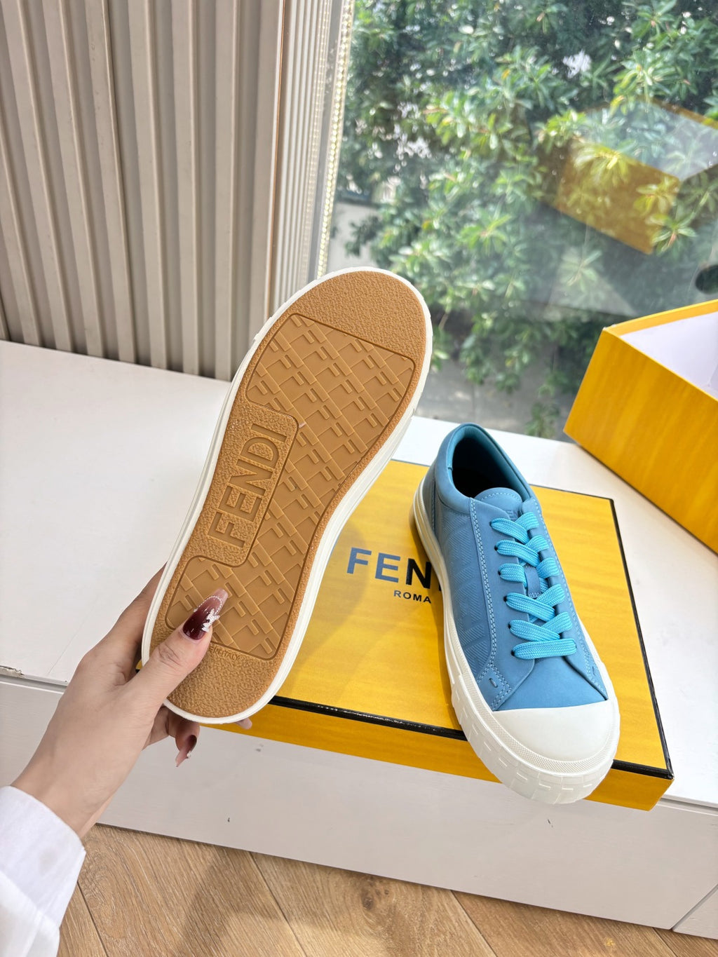 Fendi ladies low-top sneaker outsole and upper, light blue suede with turquoise laces