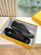 Black Fendi low-top sneakers in a box, lace-up front and rubber outsole