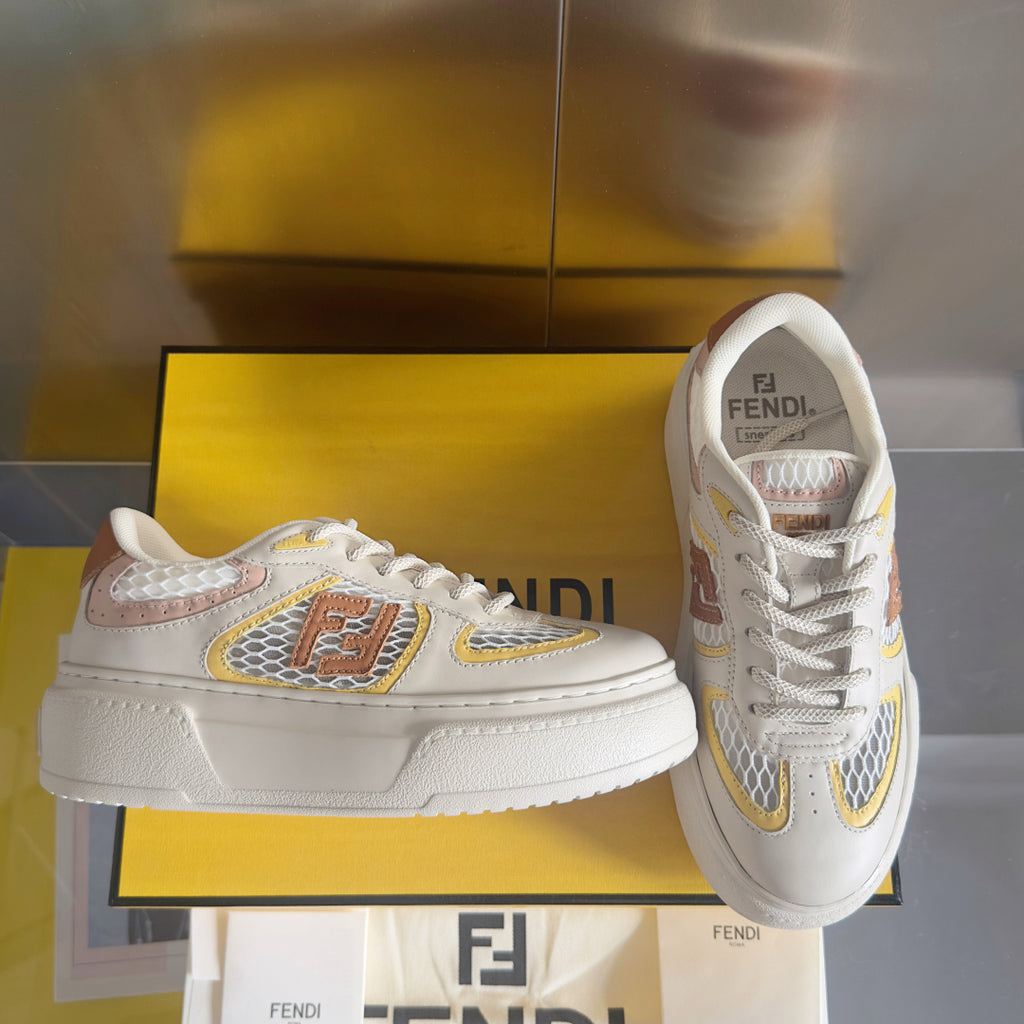 White unisex low-top sneakers with multicolor logo details and lace-up front