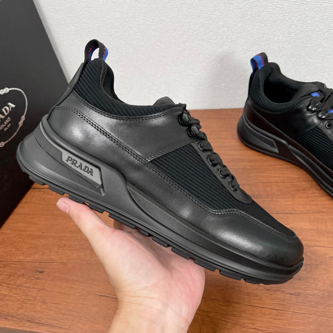 Black Prada unisex sneakers, lace-up low-top with 'PRADA' side logo