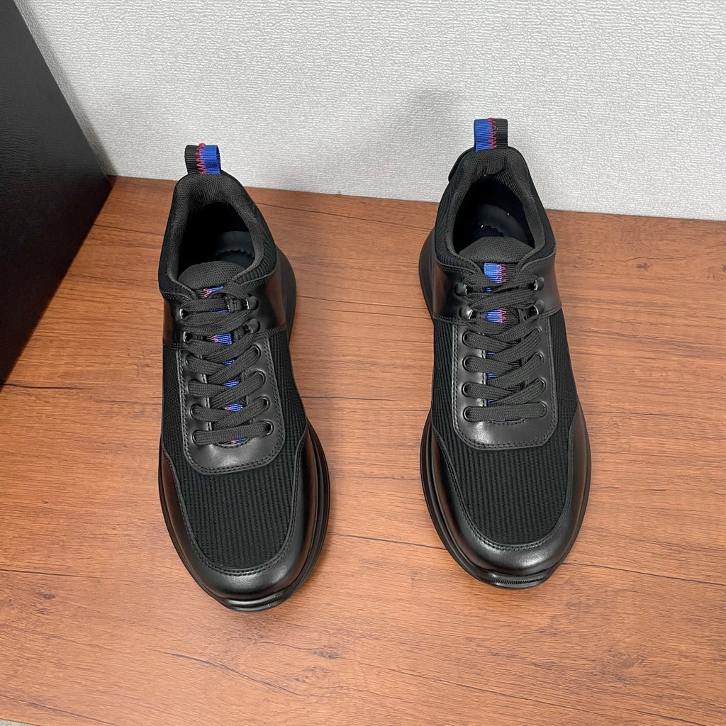 Black Prada unisex sneakers, lace-up front view with ribbed upper and rubber sole