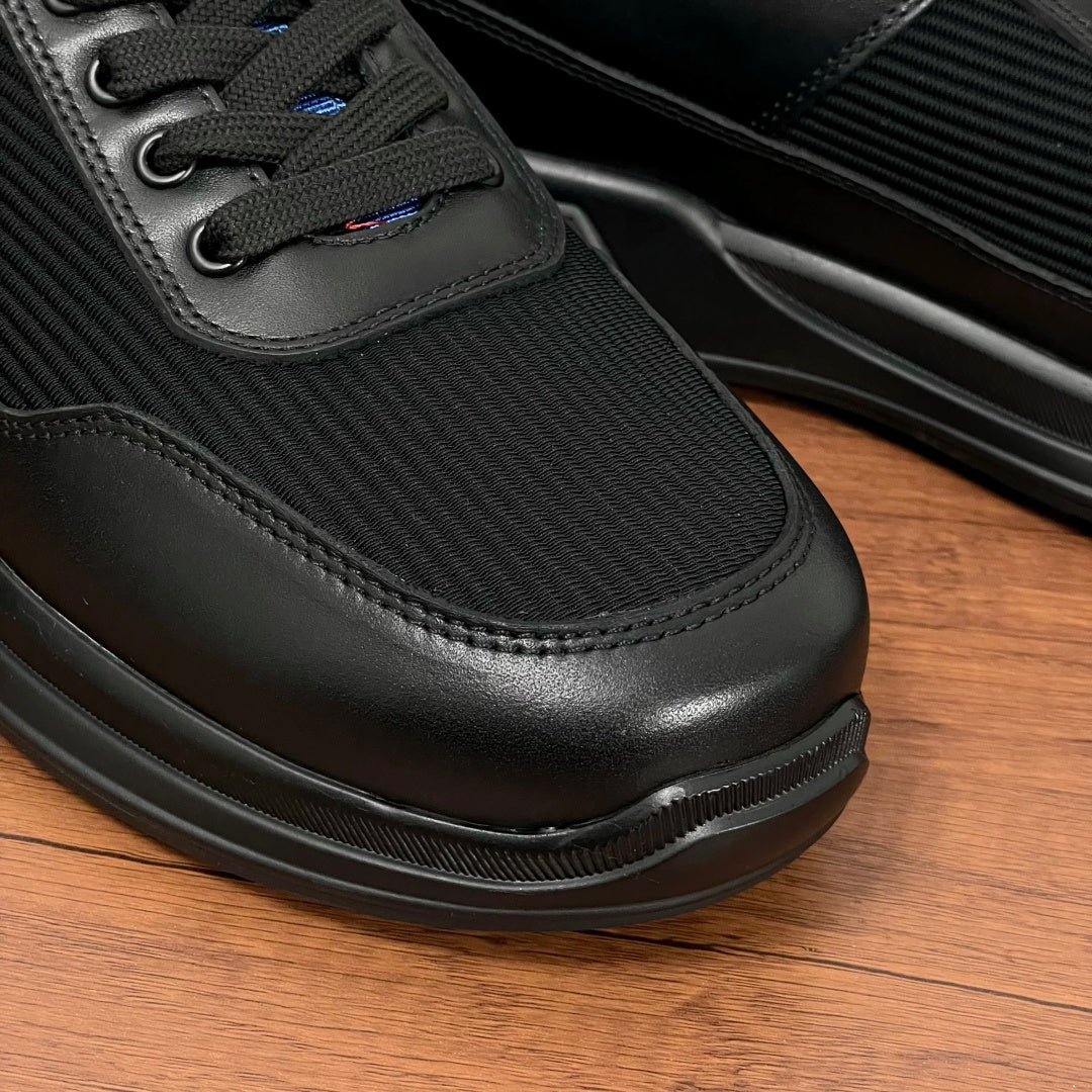Black Prada unisex sneakers, toe and sole detail with lace-up and textured side panel
