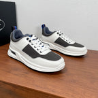 Prada unisex sneakers, white uppers and dark gray stripes, lace-up front