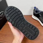 Unisex sneaker outsole with rubber tread pattern and logo on heel