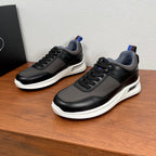 Unisex lace-up sneakers, black upper with textured panels and white rubber sole