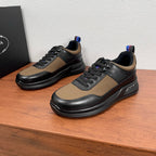 Prada unisex lace-up sneakers, black leather and tan panels, chunky rubber sole