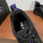 Prada unisex sneaker tongue and heel area, black textile lining with PRADA lettering