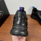 Prada unisex heel view sneaker in black leather with blue-red elastic collar