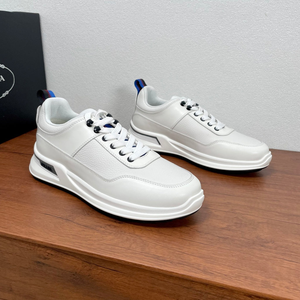 Prada unisex sneakers, white leather with side logo detail and blue-red heel tab