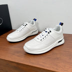 Prada unisex sneakers in white leather with blue-red heel tab and black lace tips