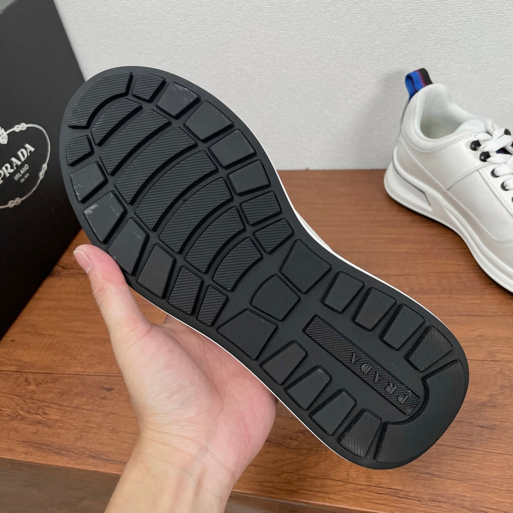 Prada unisex sneakers outsole, black rubber tread sole with embossed grid pattern