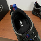 Prada unisex sneaker interior view, black lining with PRADA text near opening