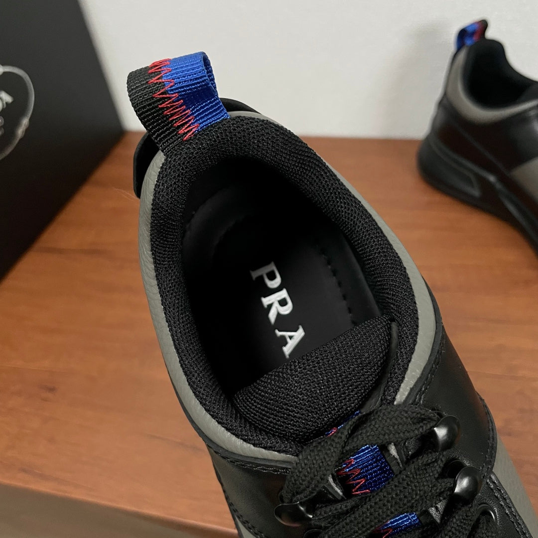 Prada unisex sneaker interior view, black lining with PRADA text near opening