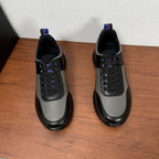 Prada unisex sneakers pair, black and gray leather with lace-up front and padded collar