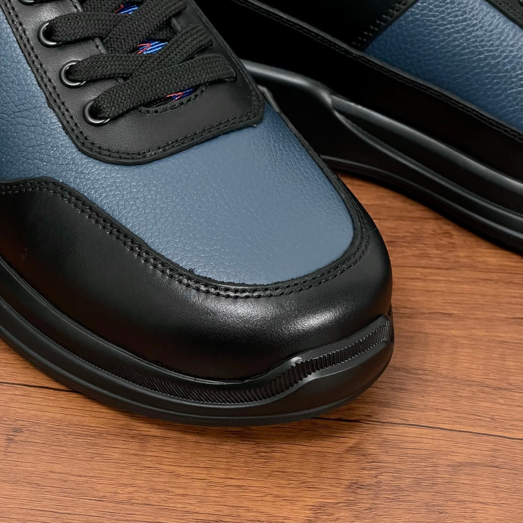 Prada unisex sneaker toe and laces in black and blue leather, thick rubber sole