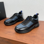 Prada unisex sneakers in black and blue leather with lace-up front