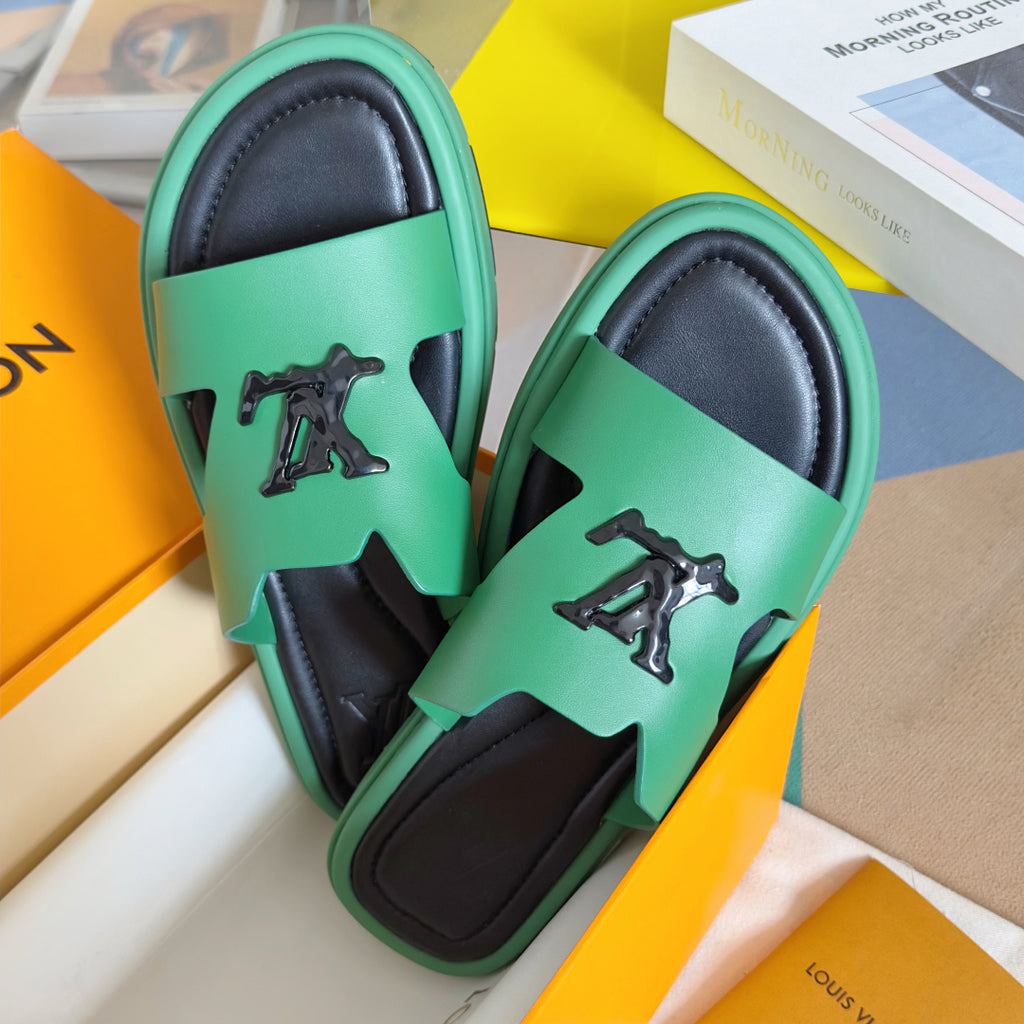 Louis Vuitton mint green sandals with black soles and front logo studs on straps