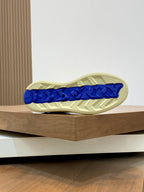 Burberry beige sneaker outsole with blue textured traction tread