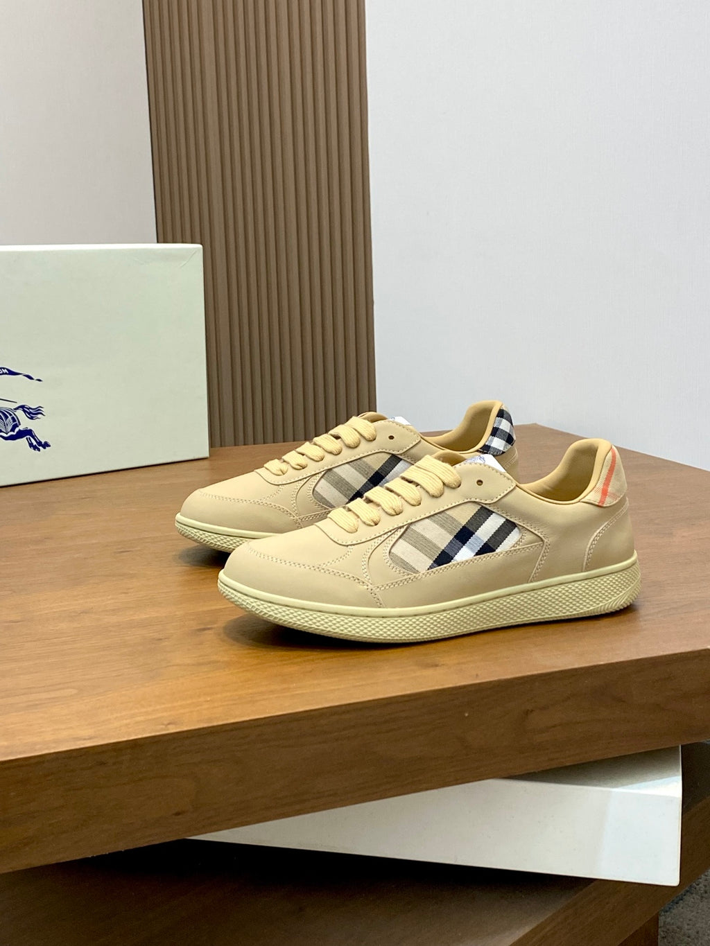 Burberry beige leather sneakers with blue-and-white check panel, lace-up