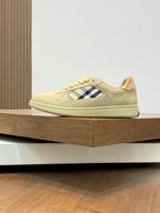 Burberry beige low-top sneakers with blue tartan stripe and rubber sole