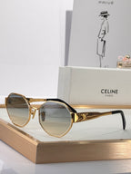 Celine sunglasses with gold round frames and amber tinted lenses