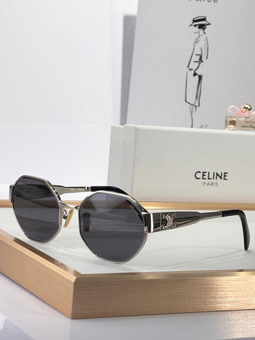 Celine sunglasses with gold and dark frames, round lenses with dark tint