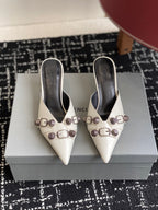 Balenciaga white heeled sandals with buckle straps and pointed toe