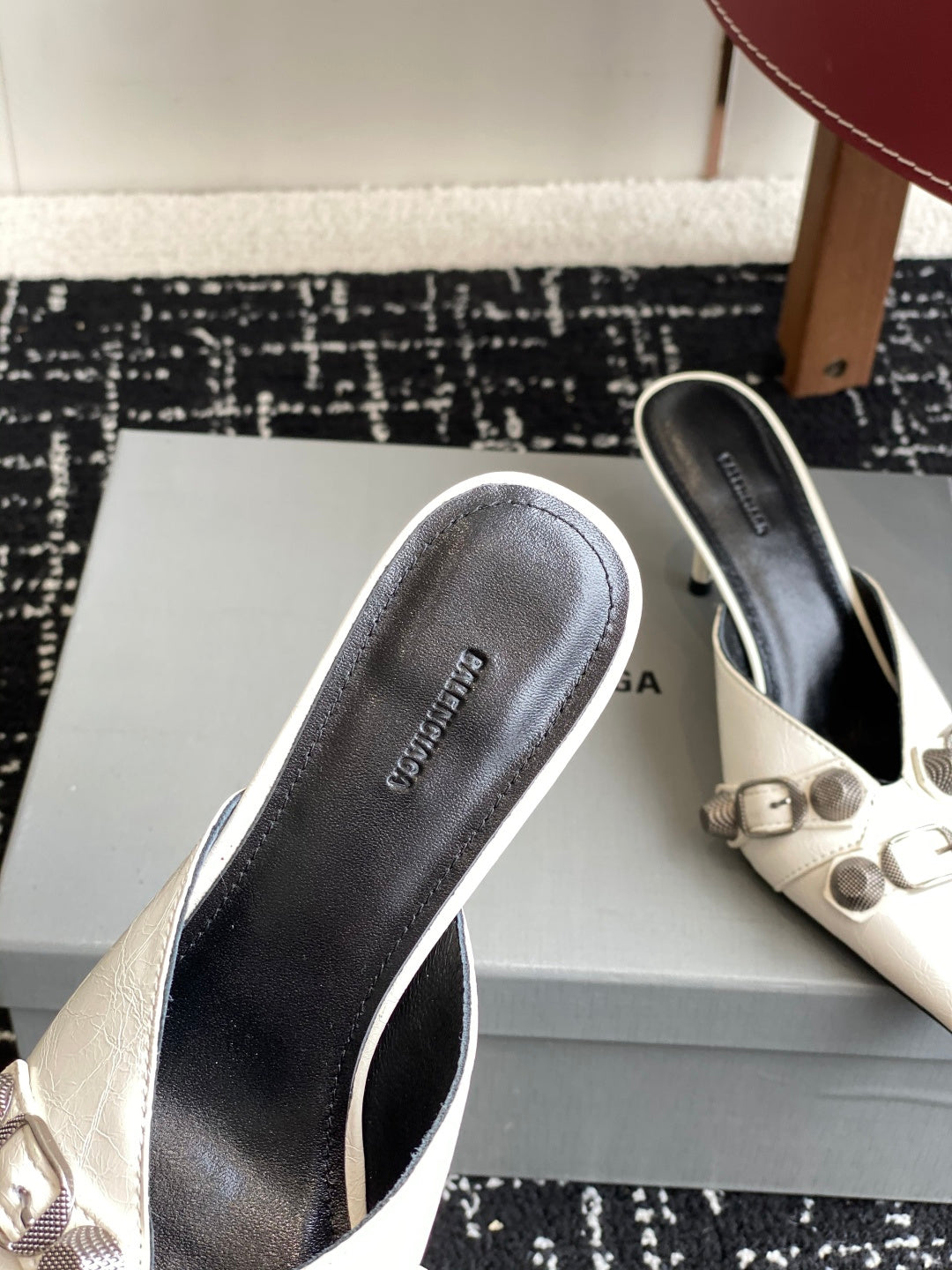 Balenciaga white heeled sandals with black interior and pointed toe