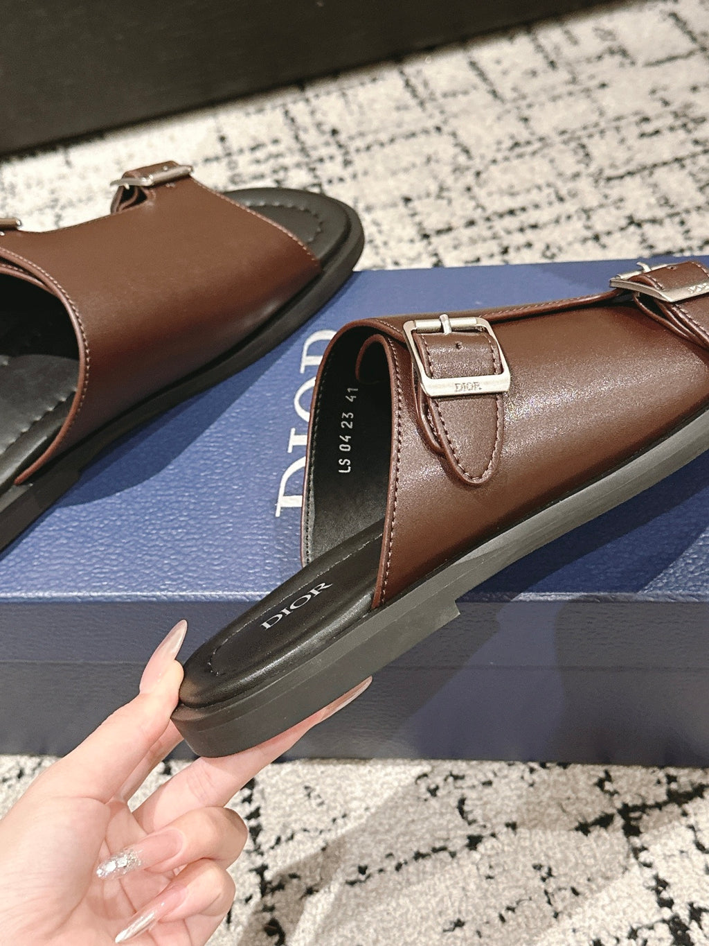 Dior brown leather slide sandals side strap and sole detail with adjustable buckle
