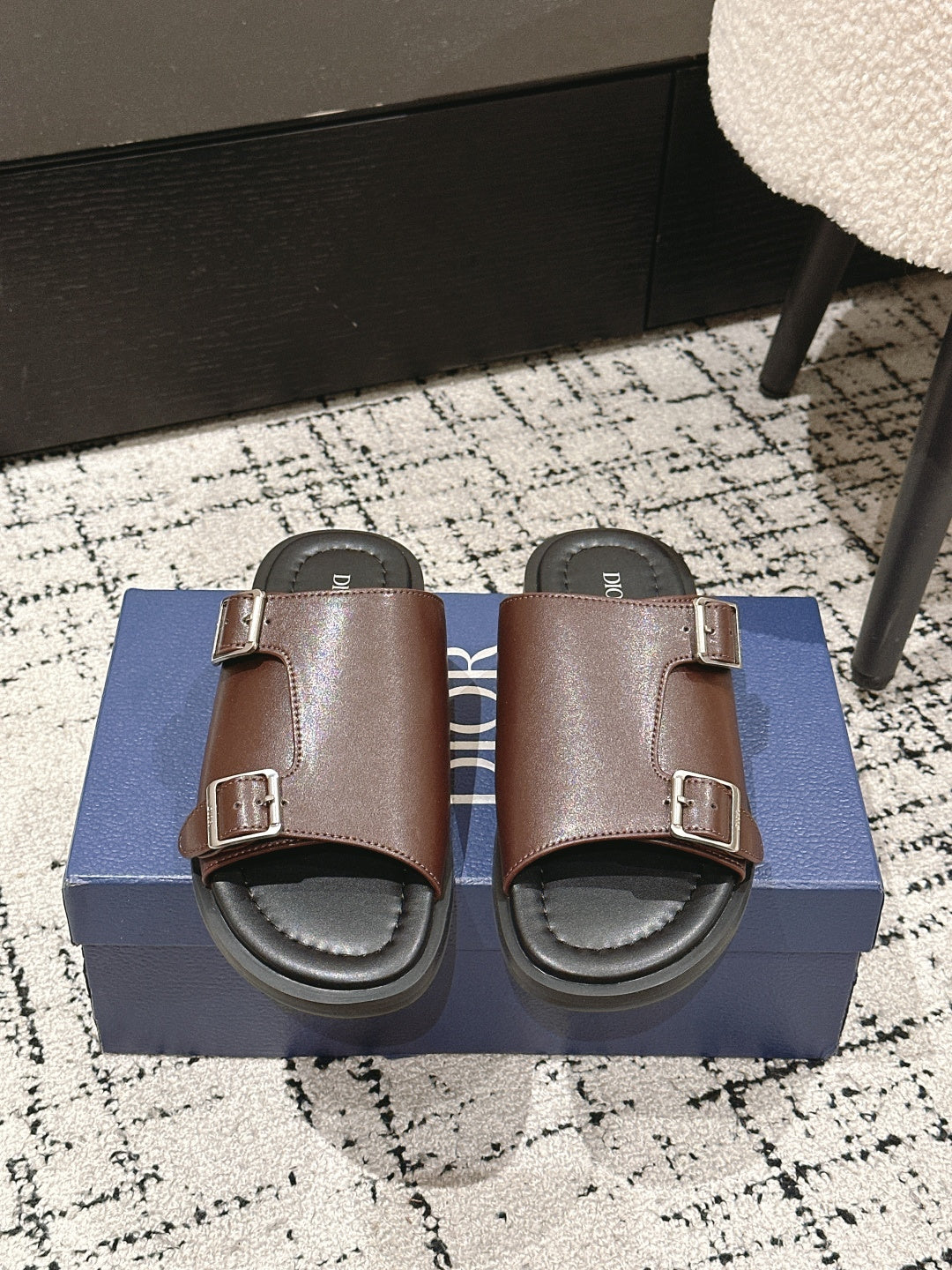 Dior brown leather slide sandals with two buckled straps and cushioned footbed