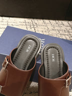 Dior brown leather slide sandals, insole and sole edge view with Dior logo